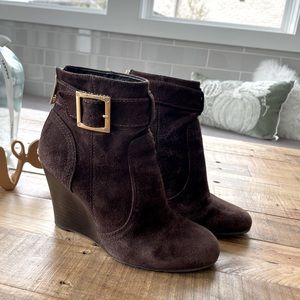 Tory Burch suede leather wedged with gold Tory hardware.
